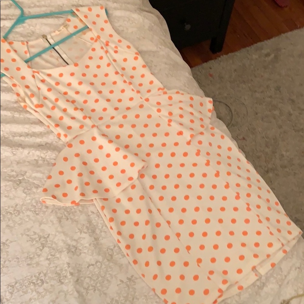 Polka dot peplum dress